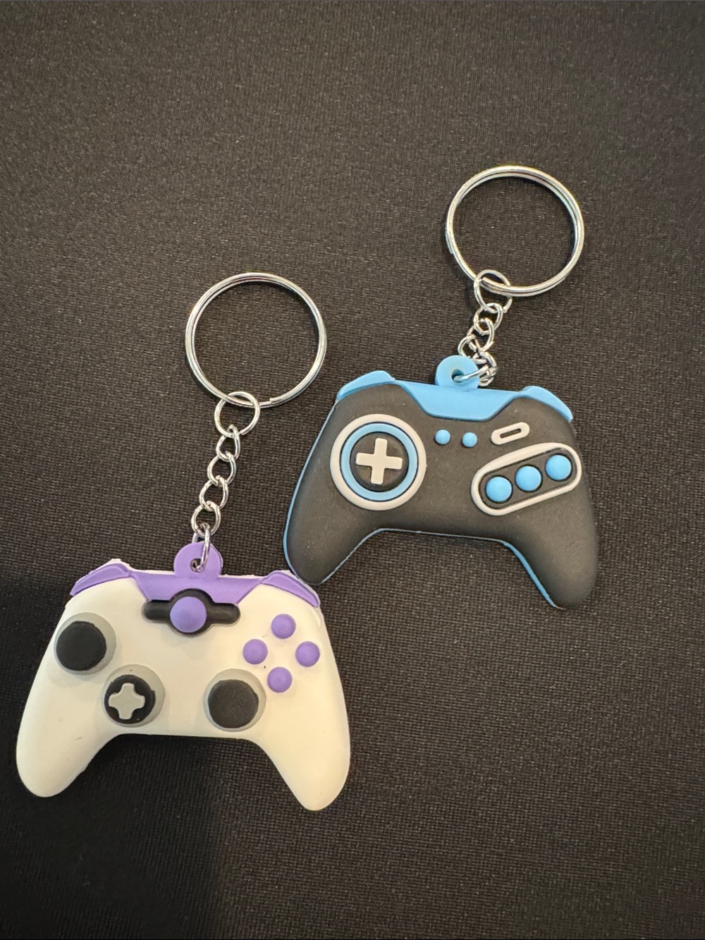 Black & White Game Controller Keychain Duo with Blue and Purple Accents
